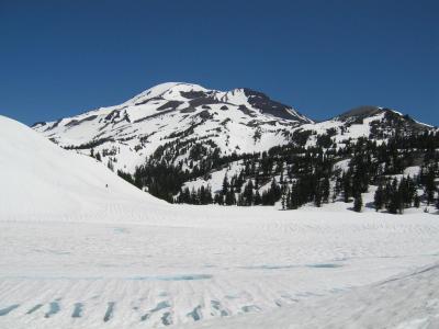 July snowboarding on South Sister